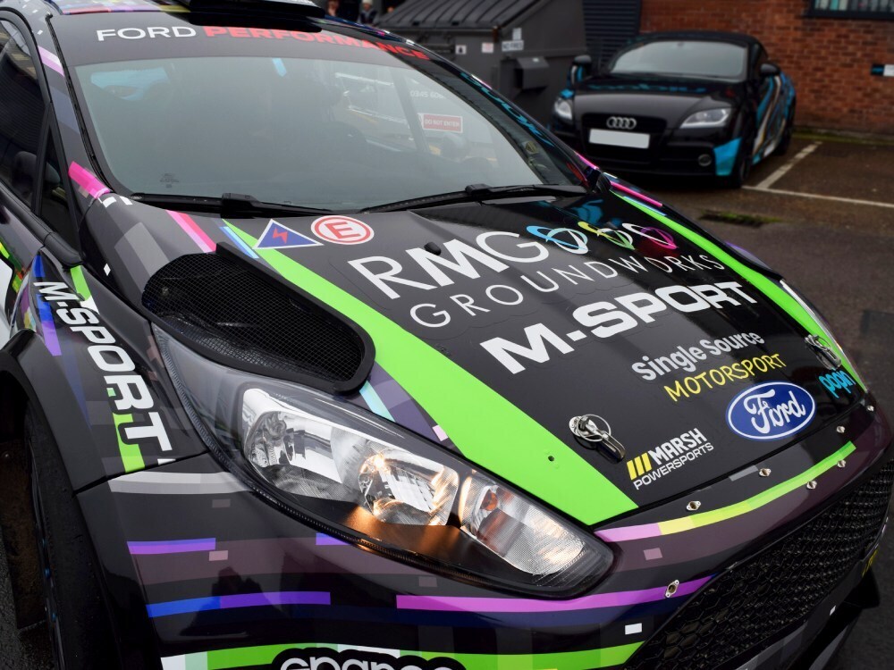 Motorsport decals on bonnet of Ford Fiesta R5 race car