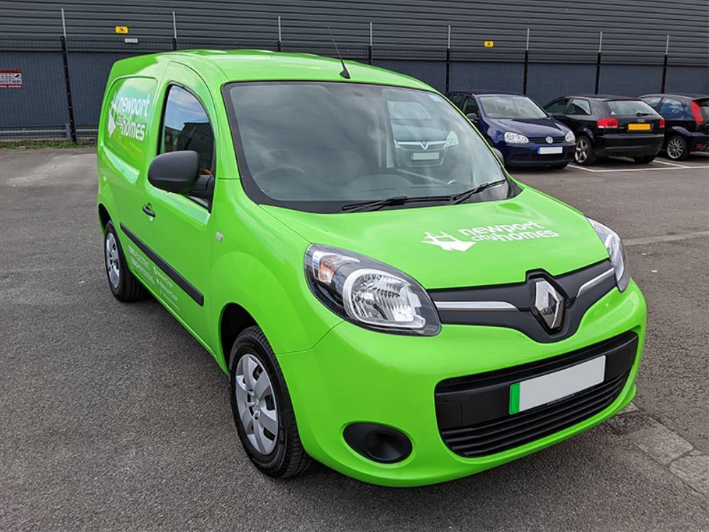Bright green company van wrap on Renault Kangoo.