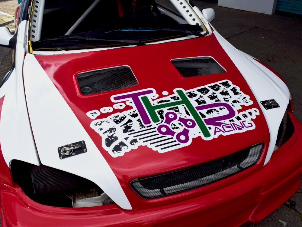 Race graphics on bonnet of a Vauxhall Astra sports car
