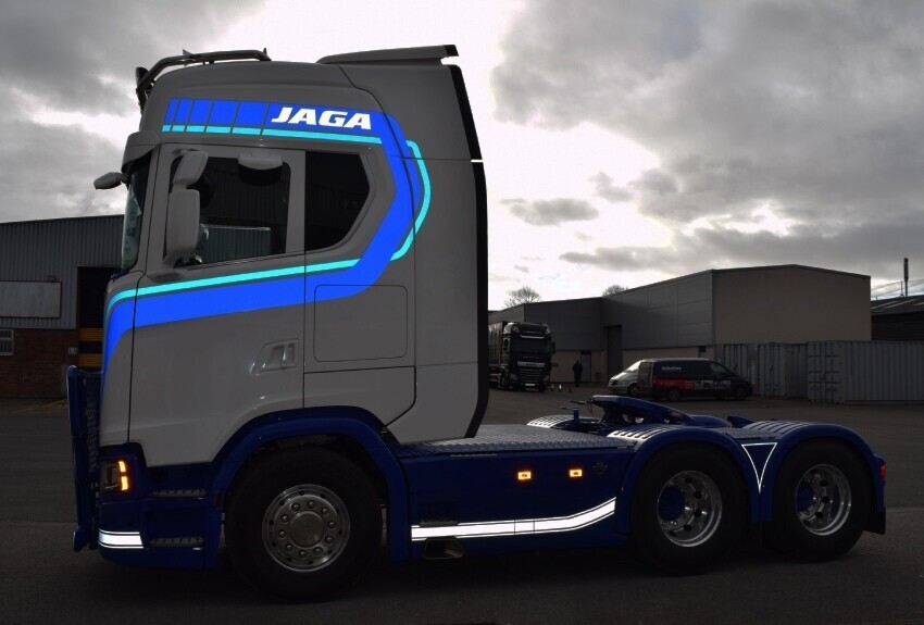 Scania fleet lorry with 3M IJ780mc reflective vinyl branding applied to side panels.