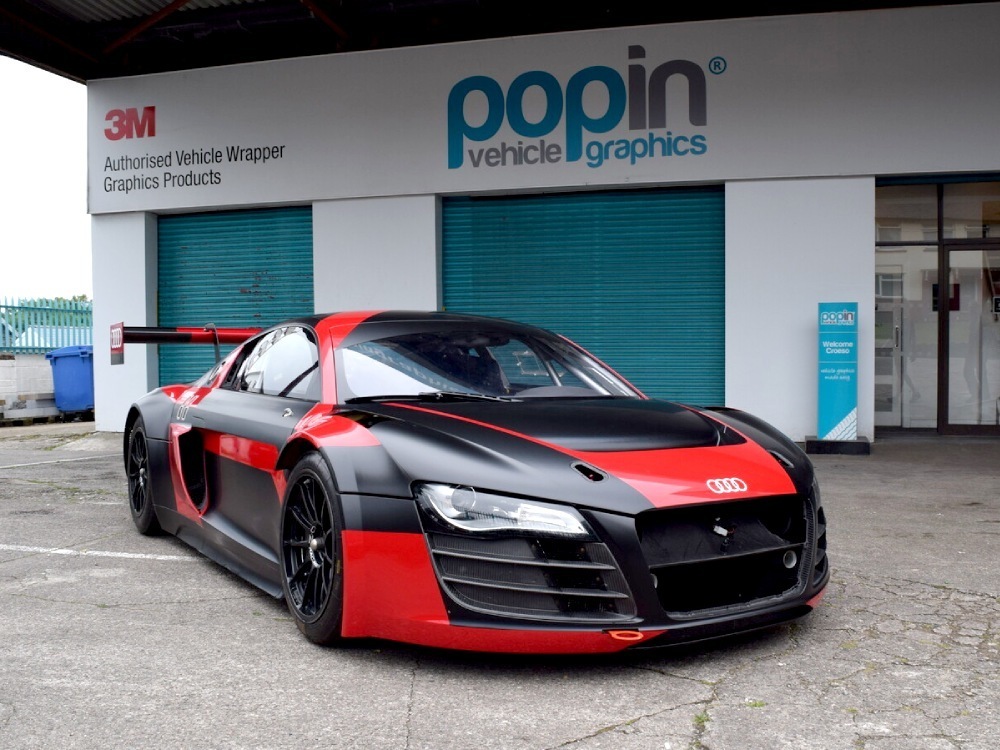 Custom red and black Audi R8 race car wrap