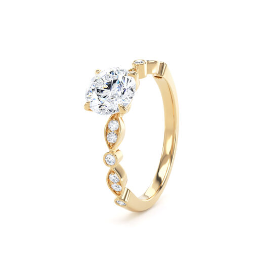 Round brilliant solitaire with fancy shaped shoulders