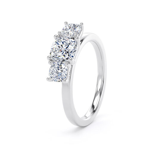 Graduated cushion cut diamond trilogy ring