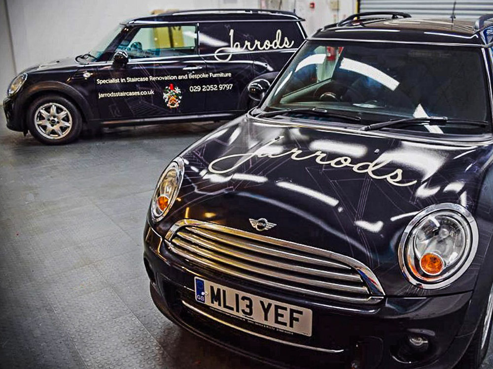 Fleet of company Mini Clubvan cars with matching branded livery for Jarrods.