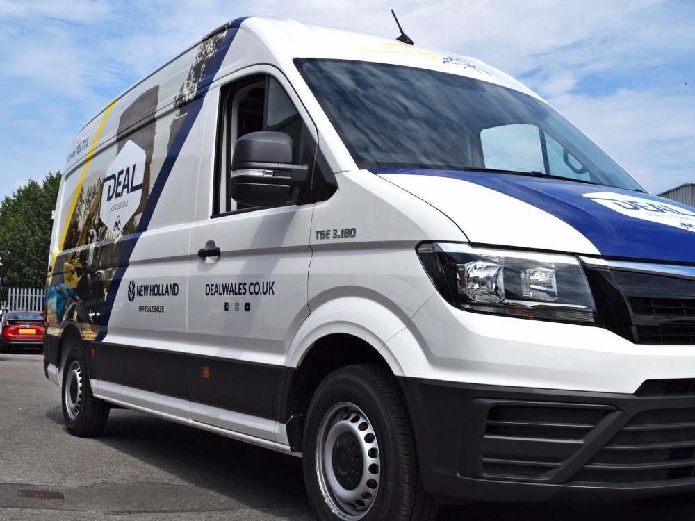MAN TGE company van with new company branded vehicle wrap installation.