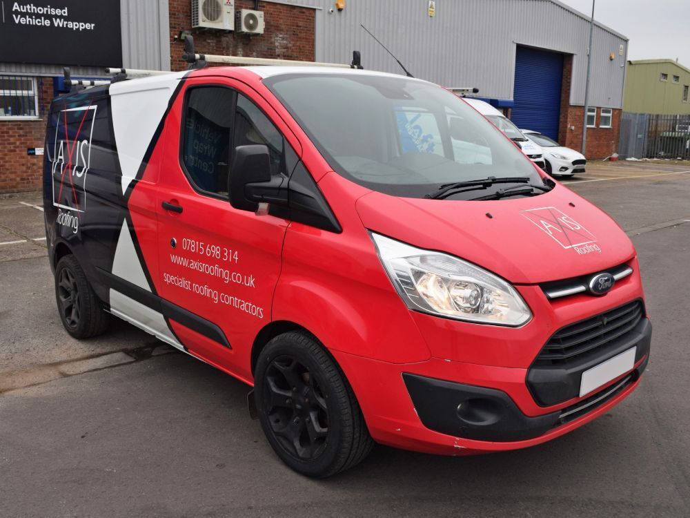Red and navy vehicle livery on company Ford Transit Custom van.