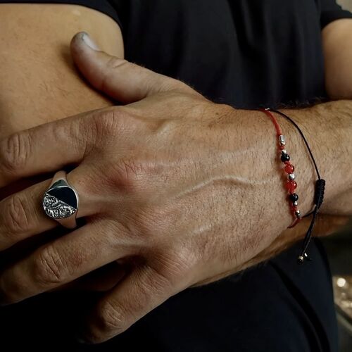 Cushion signet ring with English scrollwork