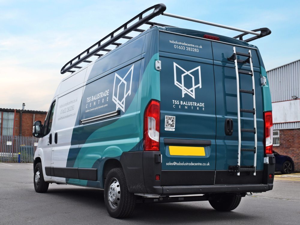 Company branded partial van wrap on Vauxhall Movano.