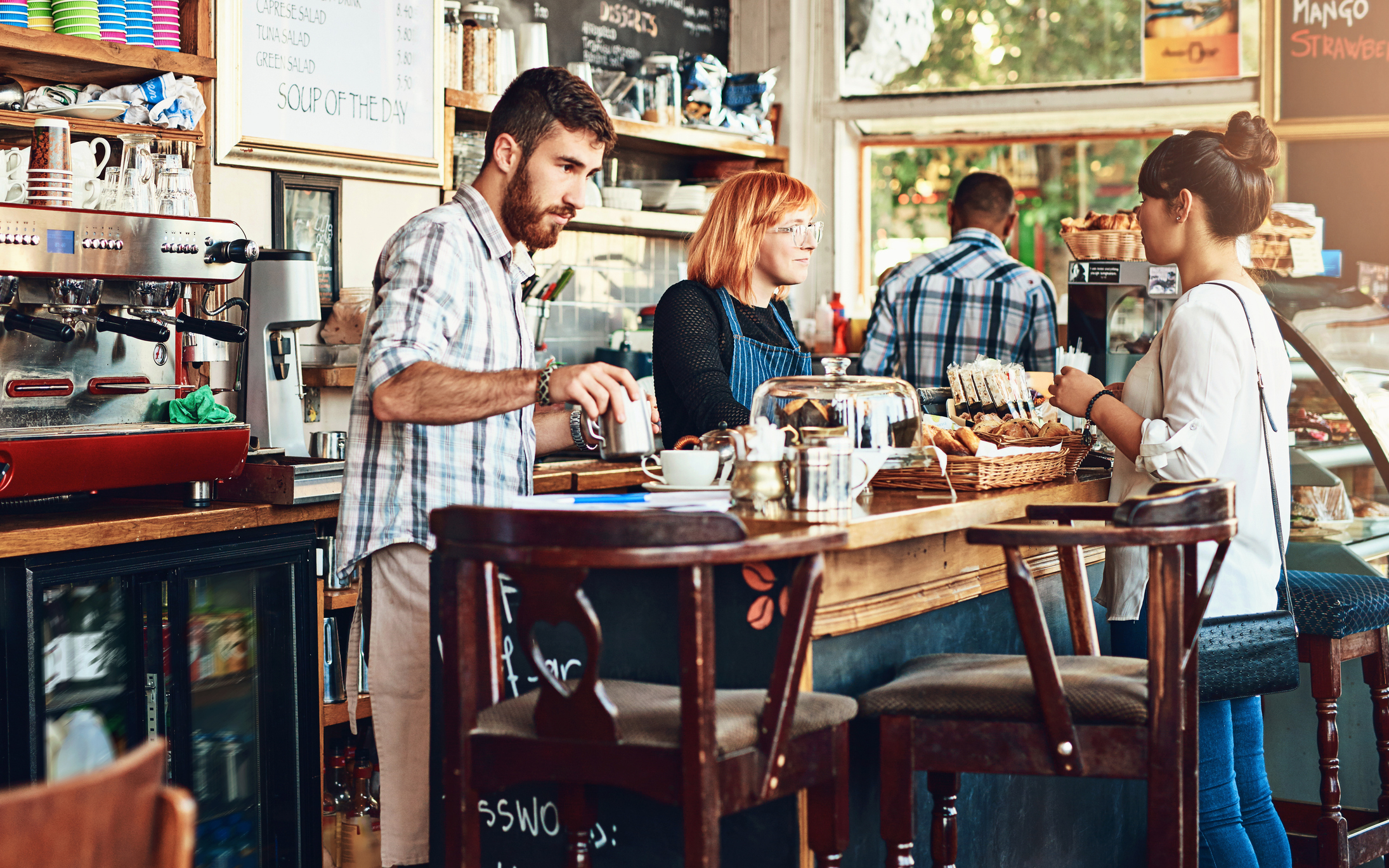 Self-employed worker considering income protection alongside health insurance