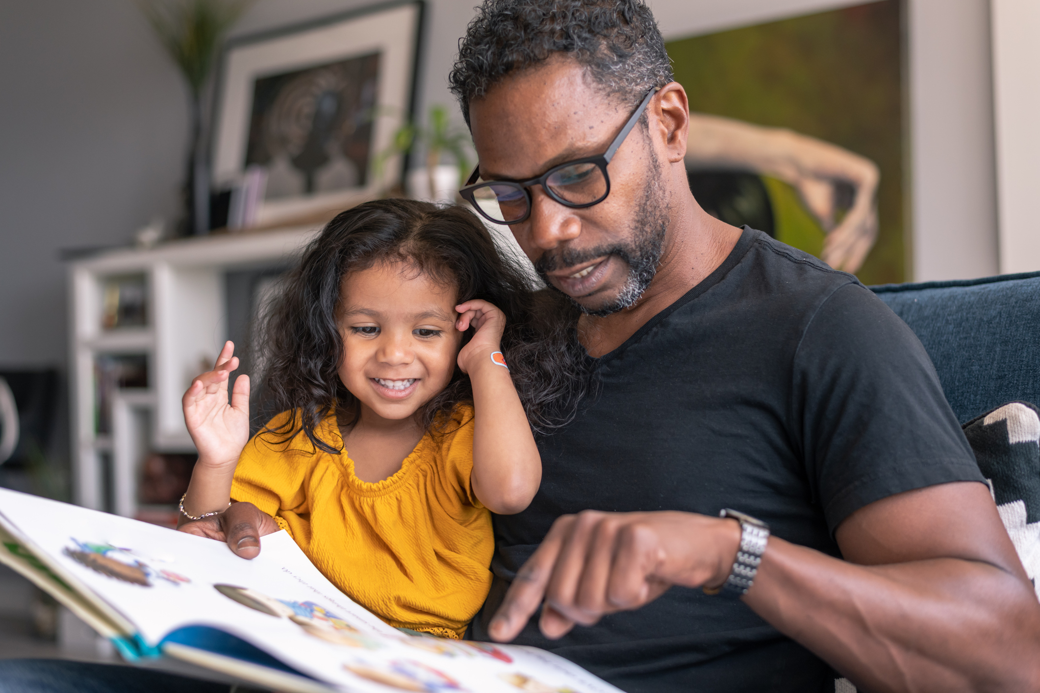 Grandfather with his granddaughter, reflecting Saga's over-50s customer base and family add-on options