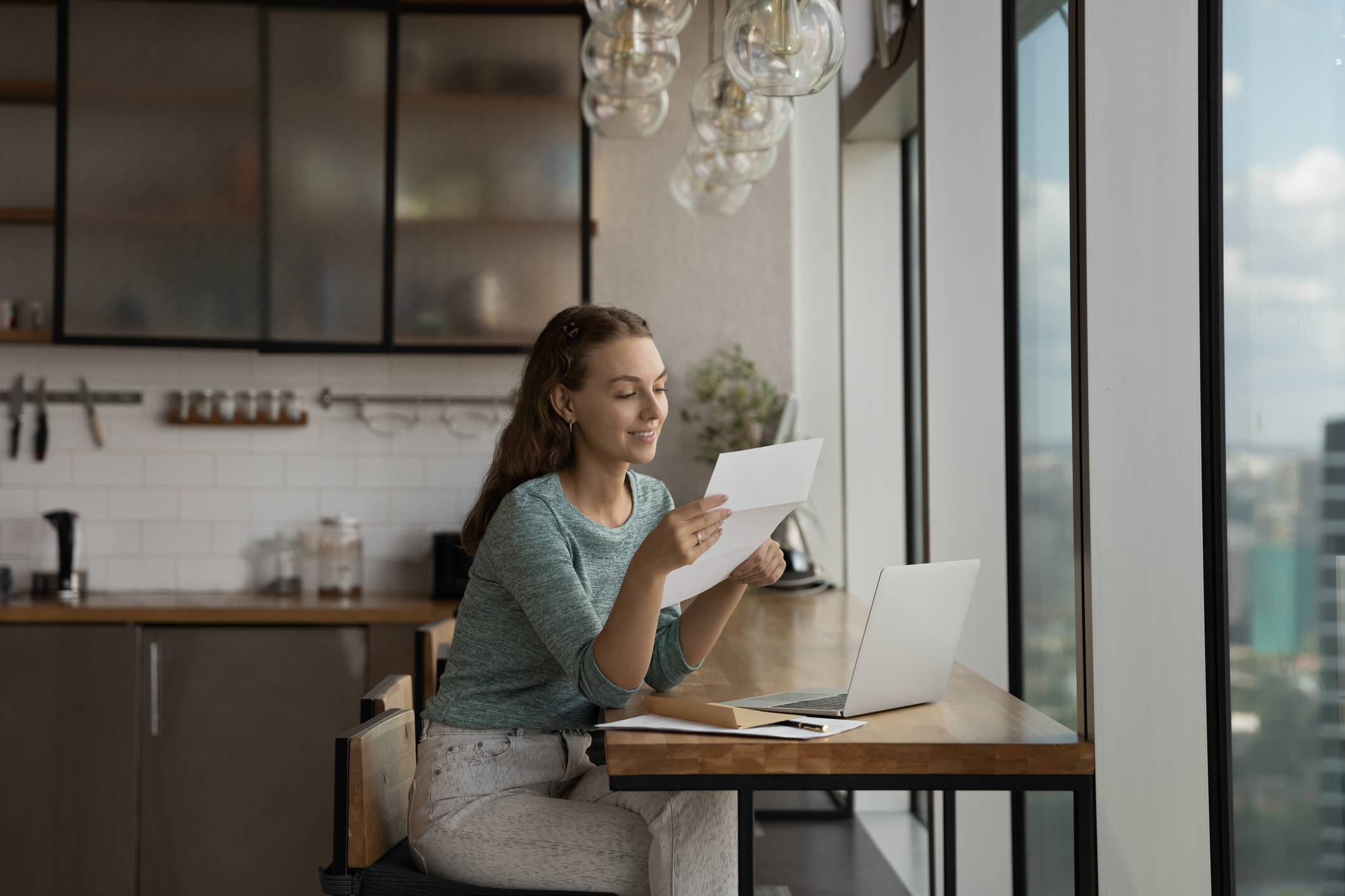 Employee reviewing their payslip to understand employer-provided health insurance