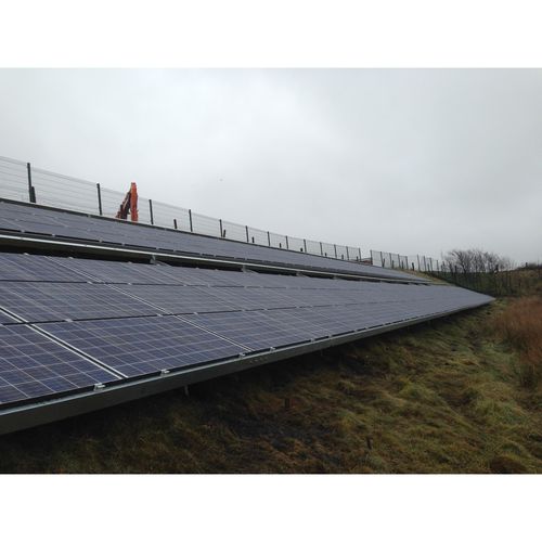 Secure fixing for ground mounted solar panels