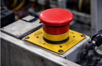 Emergency stop or guard interlock preventing a strapping machine from powering up correctly