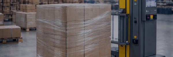 Packaging machinery including pallet wrappers and strapping machines