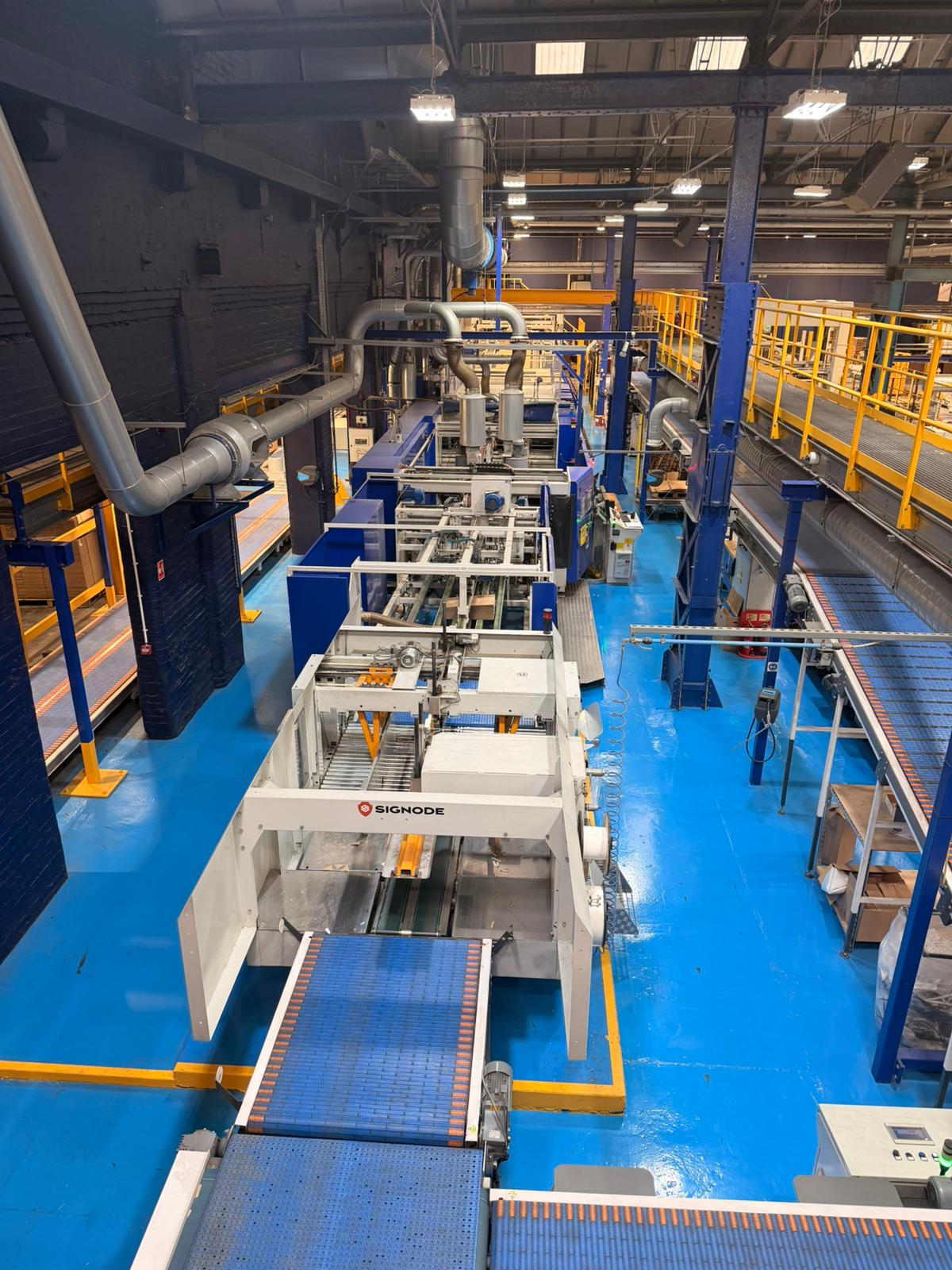 End-of-line packaging system in production environment