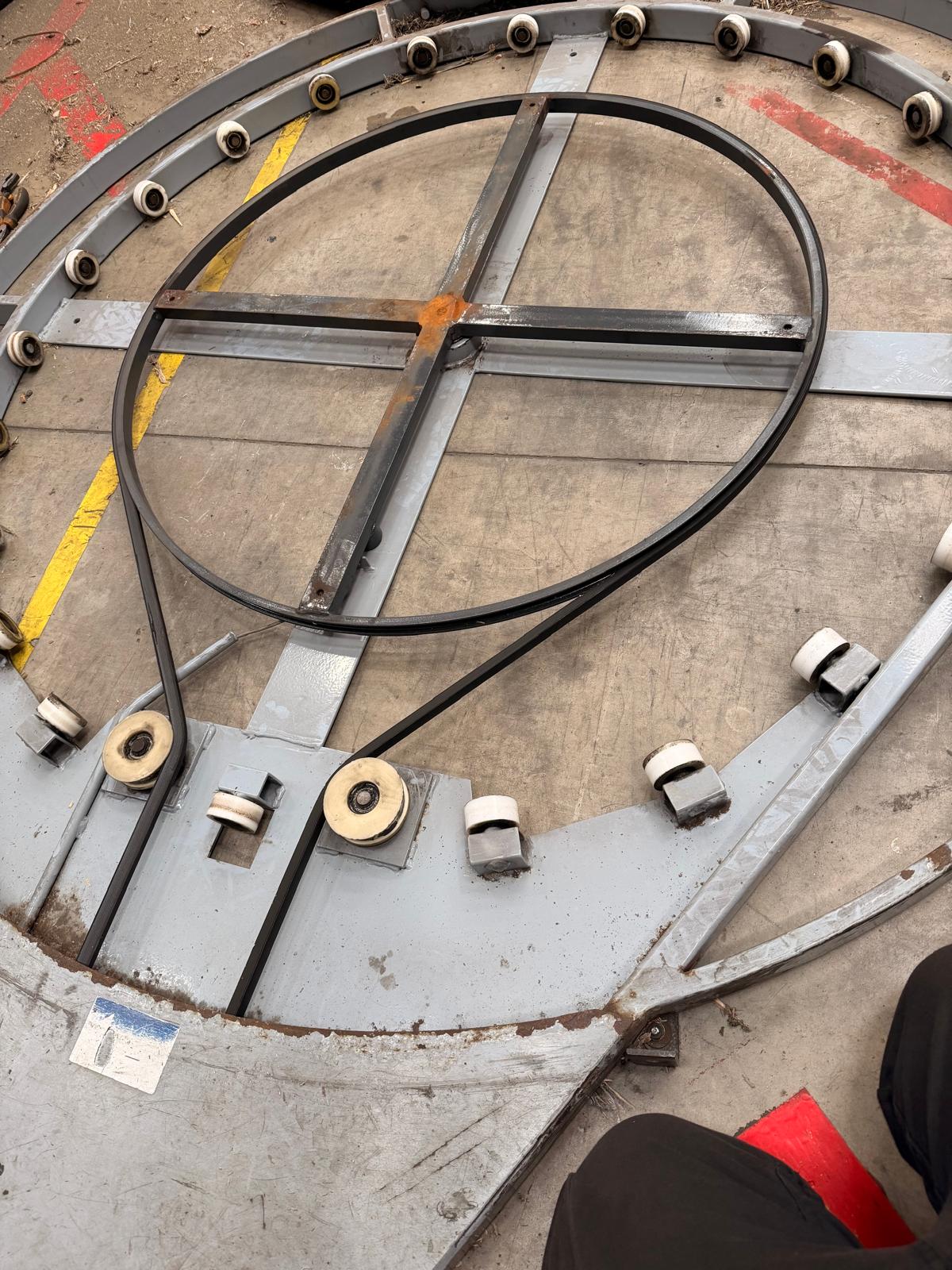 Turntable bearing or roller resistance causing a pallet wrapper to run slowly