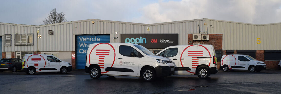 Vinyl graphics on company vans