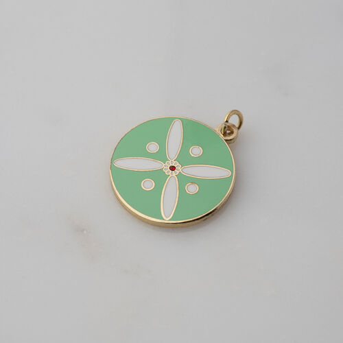 Round Pendant. The Persian Cross. White on Torquoise Green with 1 Central Red Stone.