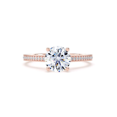 Round brilliant solitaire with mille-grain diamond set shoulders