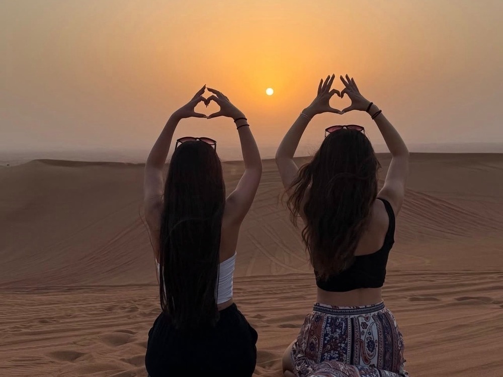Evening red dunes, desert Safari with Dune bashing Camel ride sand boarding sunset photography barbecue dinner live authentic shows belly dancing fire show & Much More