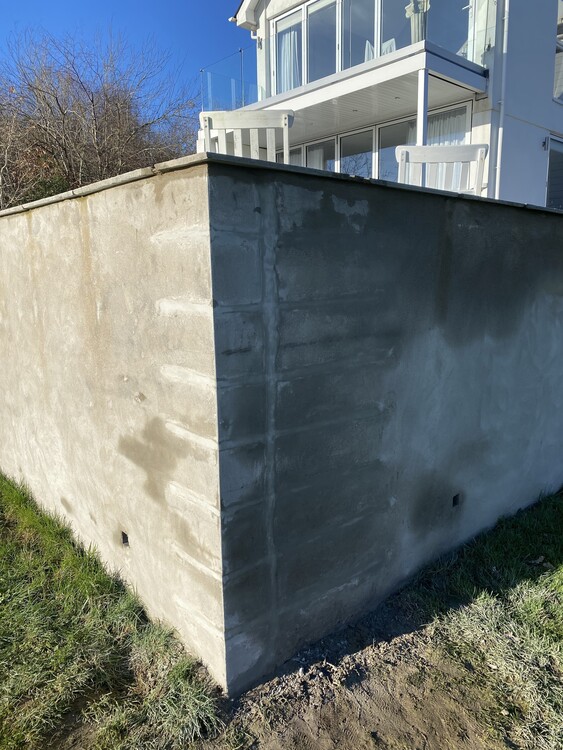 Retaining Wall crack  masonry repair using helical bars.