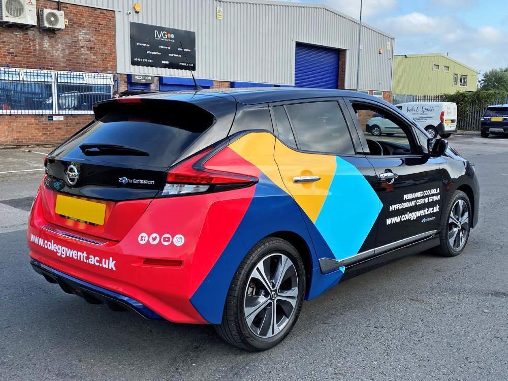 Nissan Leaf electric company car with Coleg Gwent vehicle wrap and graphics.