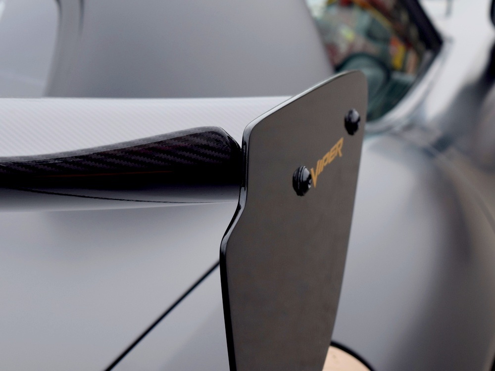 Close up details of motorsport matte wrap on parts of a Dodge Viper SRT10 sports car