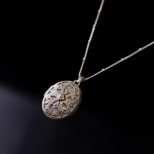 Diamond set filigree locket