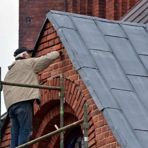 What role do surveys play in historical building restoration?