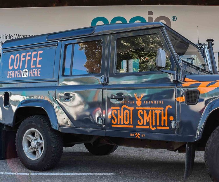 Vinyl graphics for vehicle business branding on a Land Rover Defender