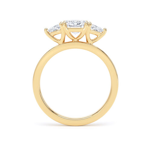 Cushion and trilliant cut diamond trilogy ring