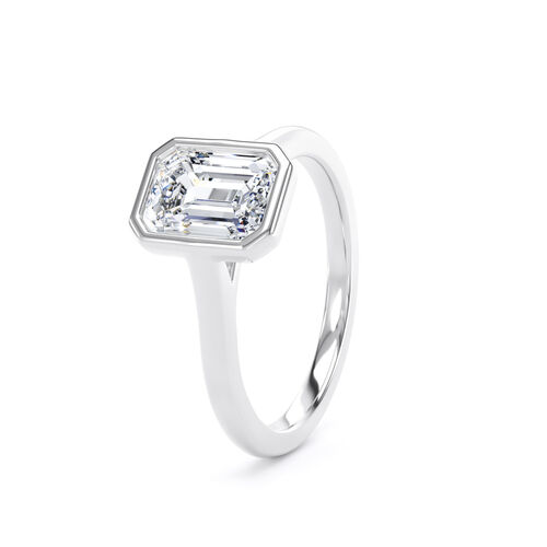 Emerald cut rubover diamond solitaire