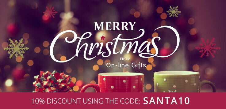Banner image showing a cosy living room out of focus, with two coffee mugs and a gift. In the middle, there is a Merry Christmas message and an offer for 10% off.