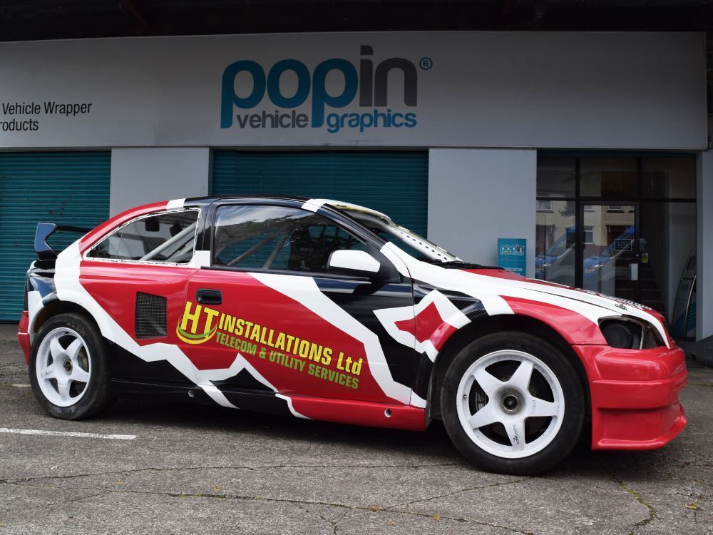 Vehicle wrap and graphics on Vauxhall Astra outside Popin in Cardiff.