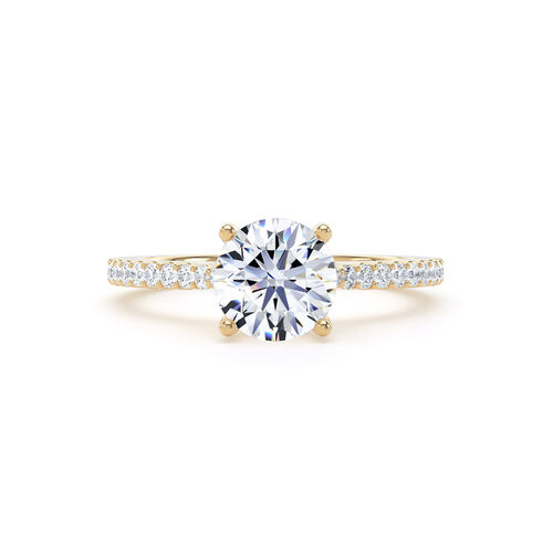 Round brilliant solitaire with diamond set shoulders