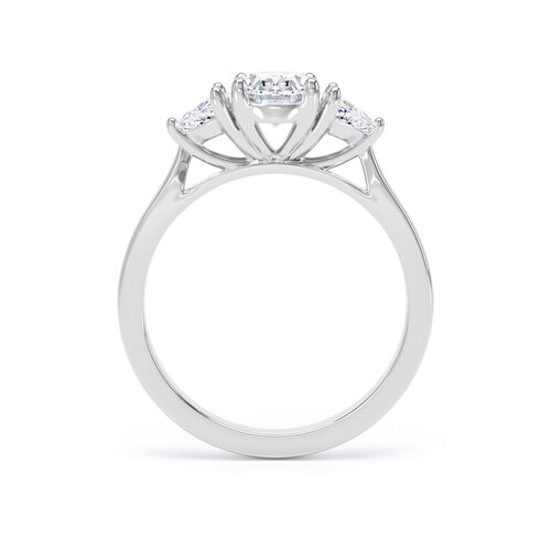 Oval and trilliant cut diamond trilogy ring