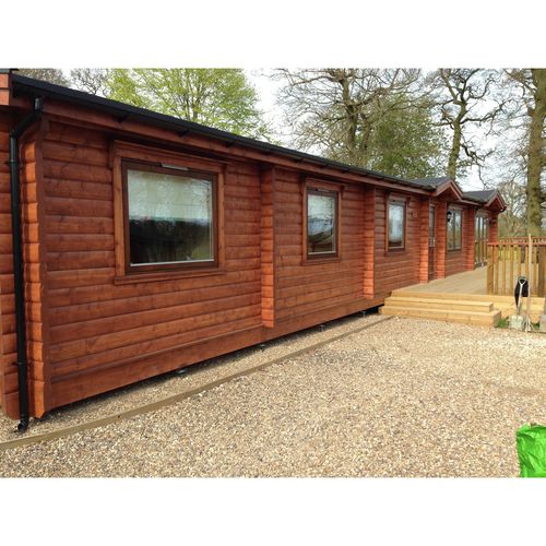 Permanent anchors for log cabins