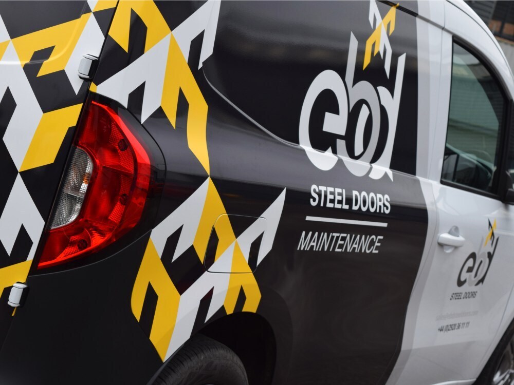 Close up of van wrap on company Mercedes Vito.