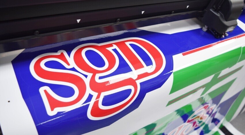 Business branded vehicle wrap being printed for installation on a Toyota Proace electric company van.