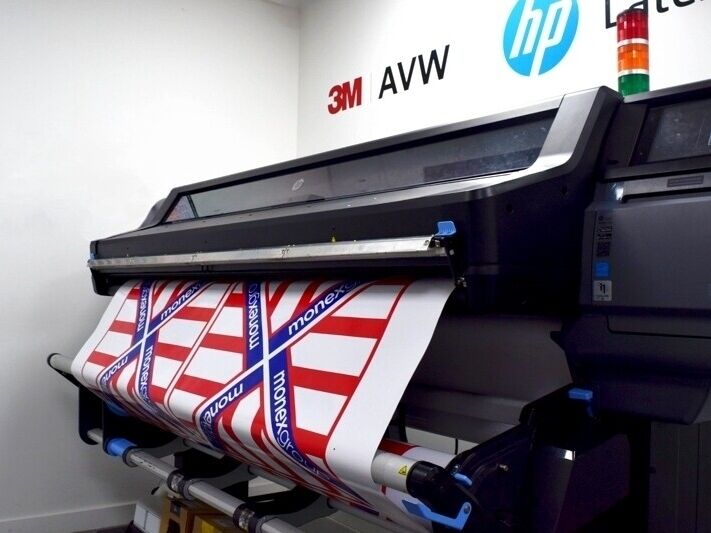 Branded templated graphic kit being printed on premium vinyl material.