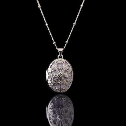 Diamond set filigree locket