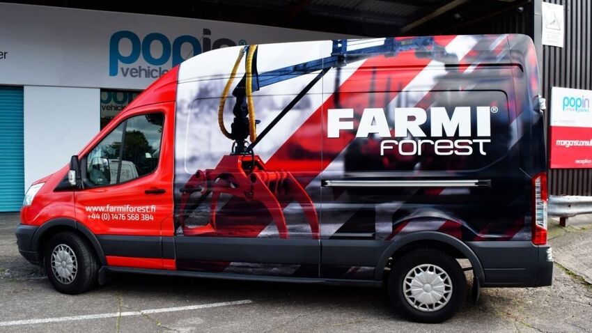Company van with new vehicle livery wrap