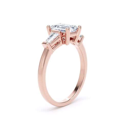 Emerald cut and tapered baguette diamond trilogy