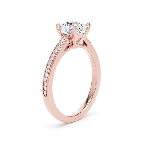 Round brilliant solitaire with straight diamond set shoulders