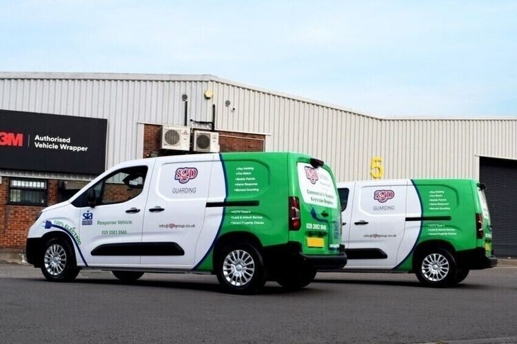 Fleet of electric vehicles with matching wraps and vinyl graphics.