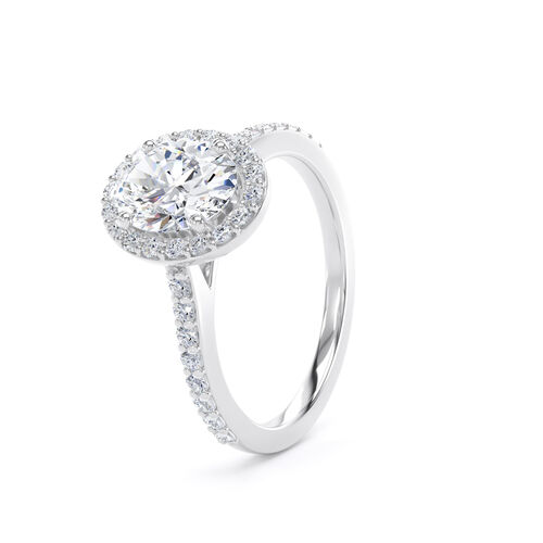 Oval halo with diamond set shoulders