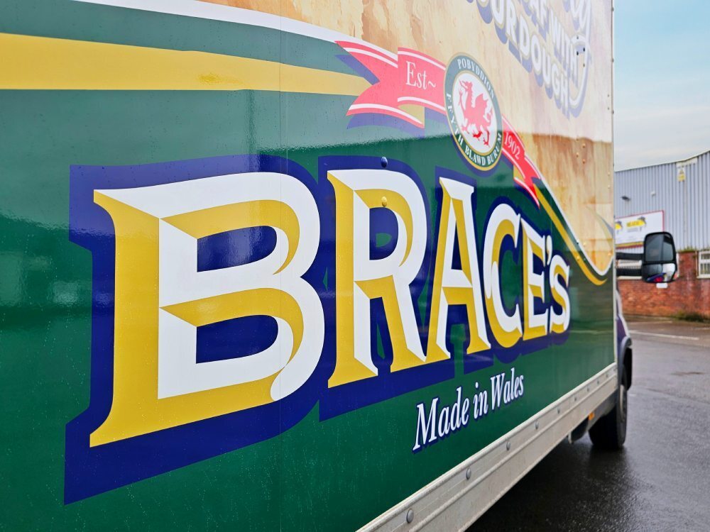 Close up of Brace's Bread branded vehicle livery on side of Iveco Daily Luton Box van.