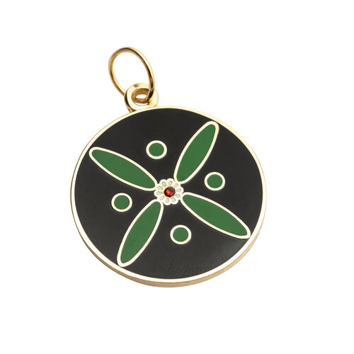 Round Pendant. The Persian Cross. Green on Black with 1 Central Red Stone.