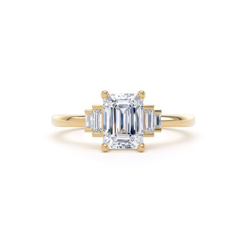 Emerald cut solitaire with stepped baguette cut diamond shoulders