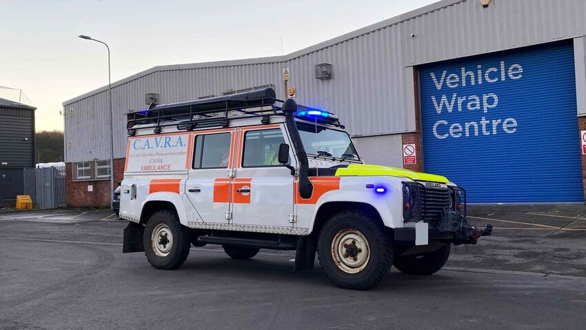 Reflective vinyl wrap and graphics on an emergency Land Rover Defender